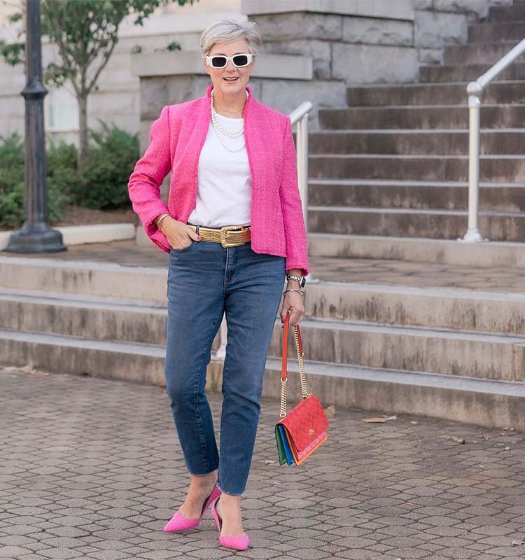 Beth wears pink blazer and pumps with jeans and a white top | 40plusstyle.com