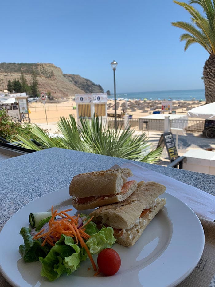 Cafes and restaurants on the boulevard of Praia da Luz | 40plusstyle.com