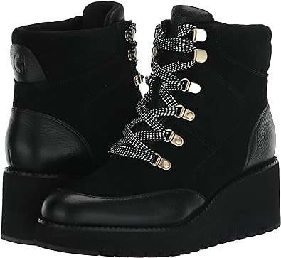 Best winter boots for women: Cole Haan Zerogrand City Wedge Waterproof Boots | 40plusstyle.com