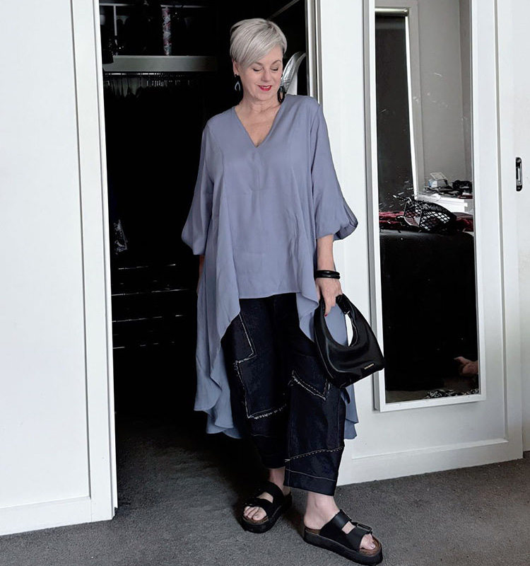 Tops to hide a tummy - Deborah in an asymmetric outfit | 40plusstyle.com