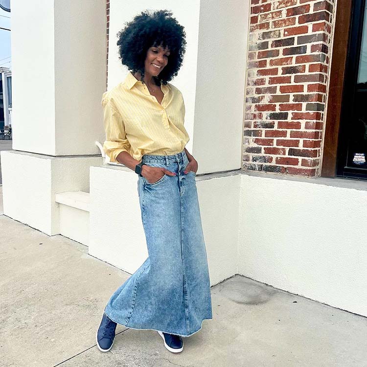 Diane wears a yellow shirt and denim skirt | 40plusstyle.com