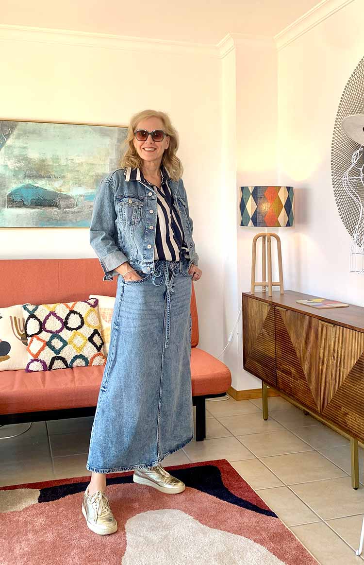 Sylvia wears a denim jacket and skirt | 40plusstyle.com