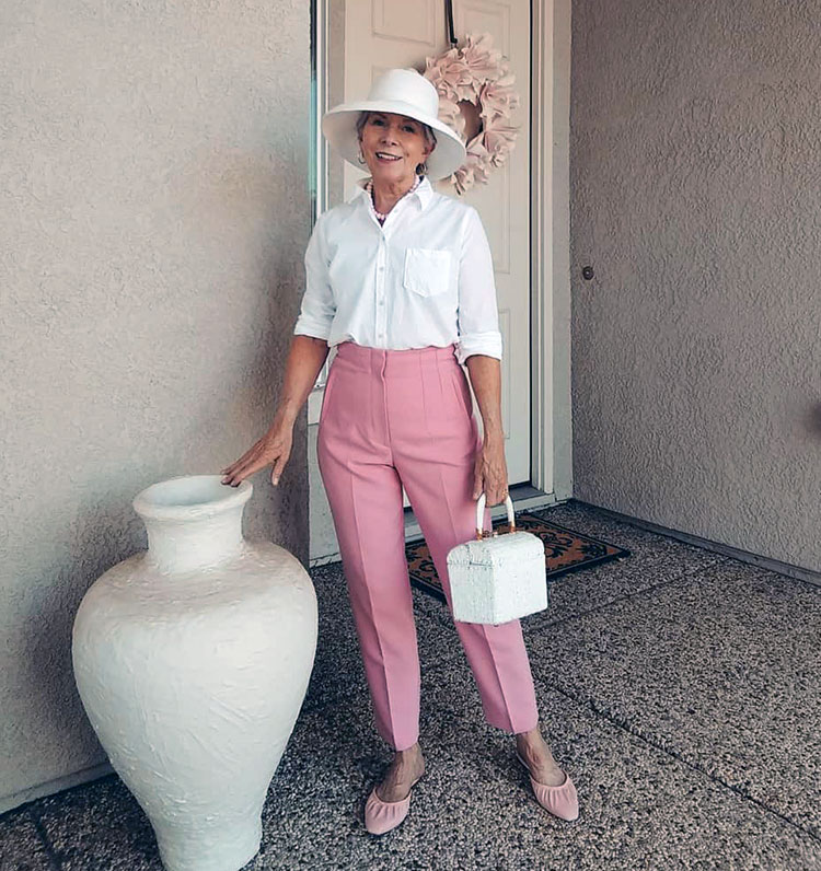 Eileen in a white shirt and pink pants | 40plusstyle.com