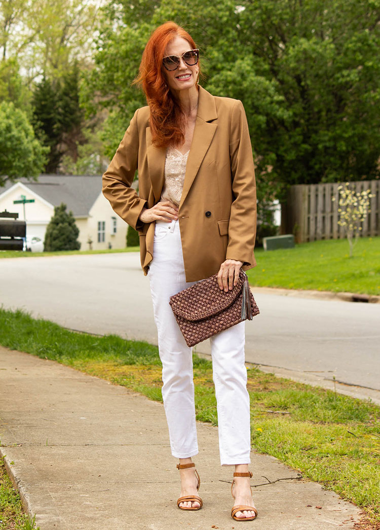 Jess in a tan blazer and white jeans | 40plusstyle.com