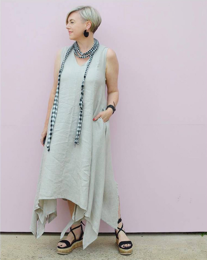 Deborah wearing plain dress and checkered scarf | 40plusstyle.com