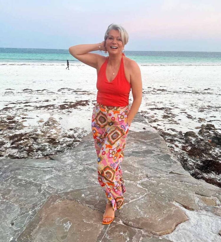 Bathing suit cover ups - Nikki wears print palazzo pants at the beach | 40plusstyle.com