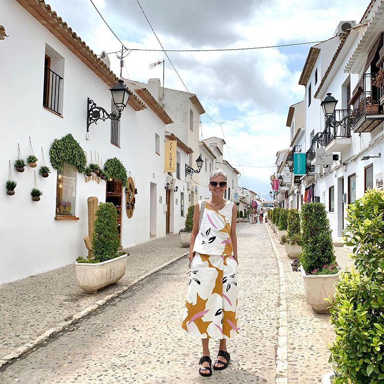 Sylvia wears a matching floral top and culottes set | 40plusstyle.com