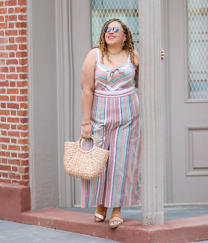 Summer jumpsuits for women - Sandra wears a striped jumpsuit | 40plusstyle.com